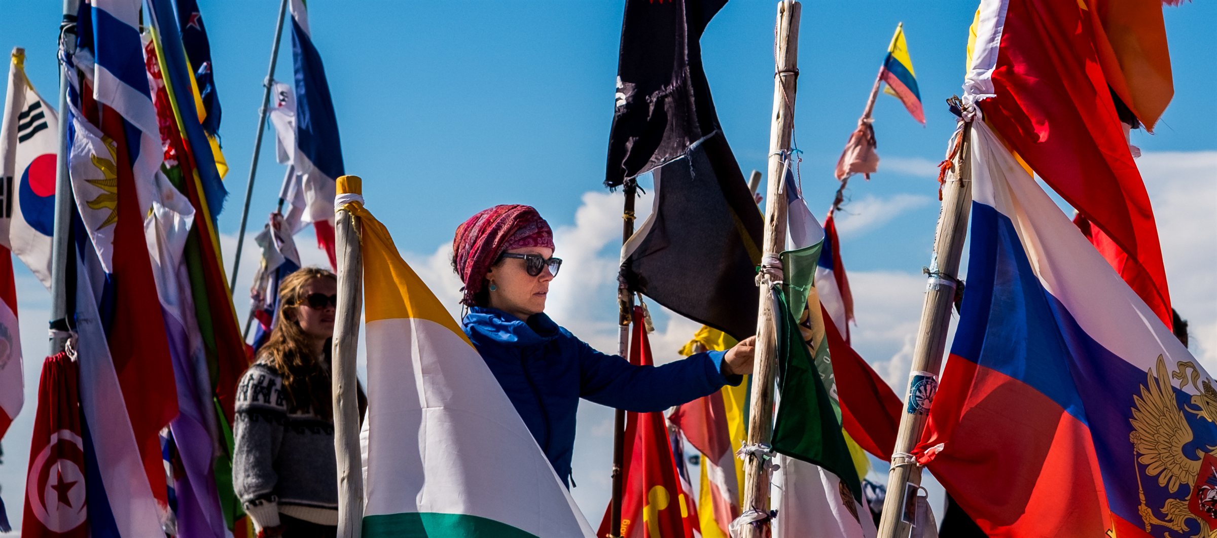 Flags of many nations flying on the salt flats