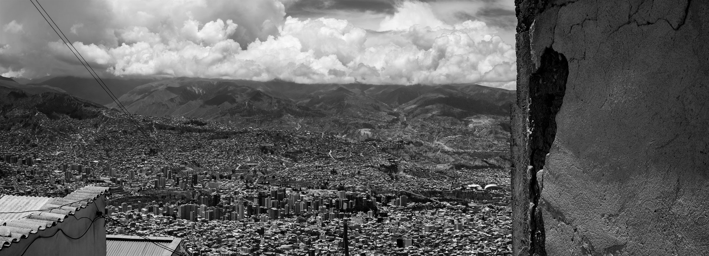 La Paz spread across its valley beside a rock face