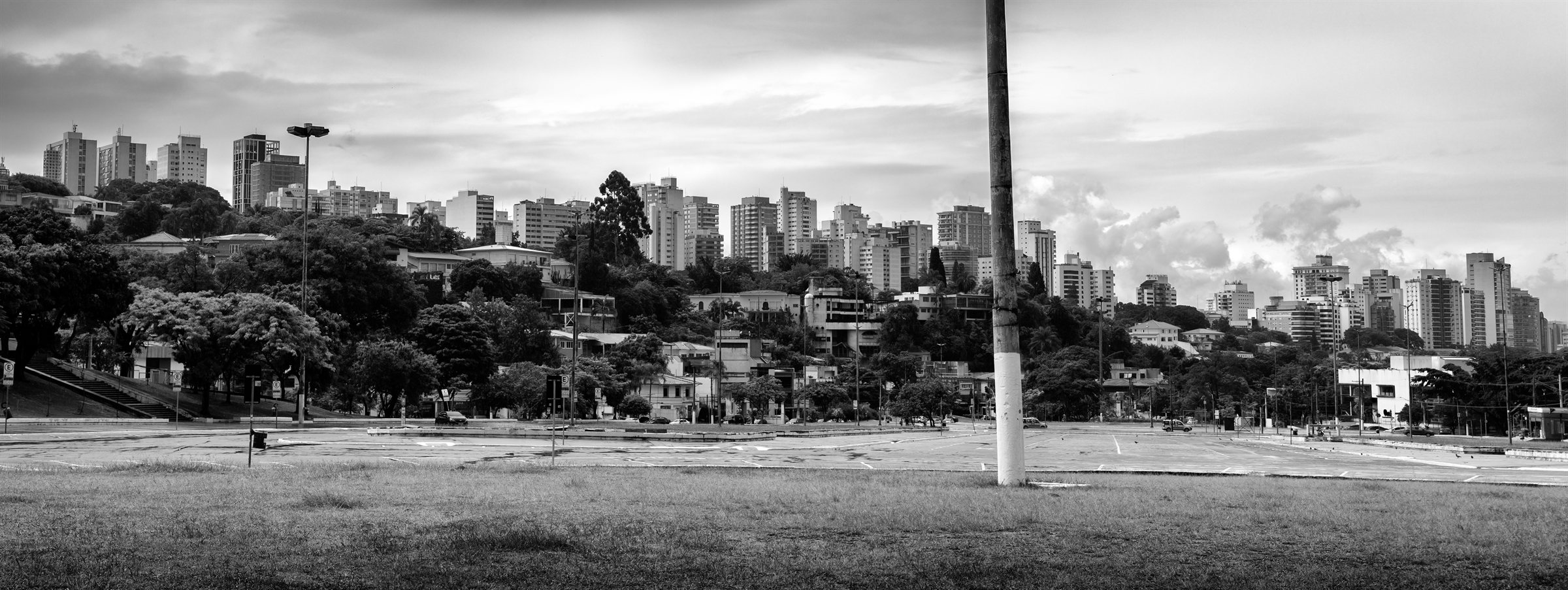 Towers rising beyond a city square